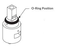 Replacement mixer valve cartridge and locating holes